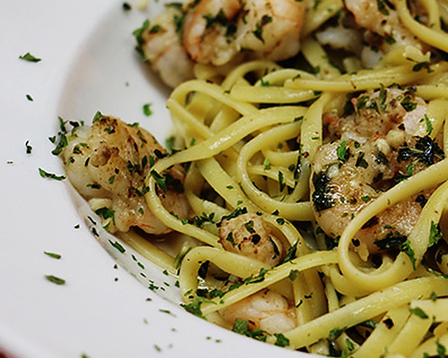 Shrimp over pasta in a cream sauce